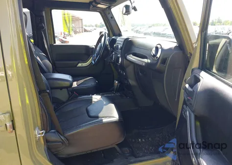 2013 Jeep Wrangler Unlimited Freedom Edition z USA, uszkodzony, nr VIN 1C4BJWDG2DL599679